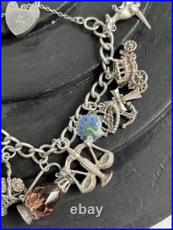 VINTAGE 1975 STERLING SILVER 3D CHARM BRACELET AND CHARMS with HEART CLASP VINTAGE 1975 STERLING SILVER 3D CHARM BRACELET AND CHARMS with HEART CLASP