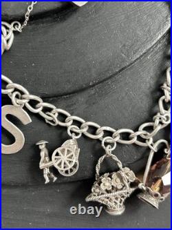 VINTAGE 1975 STERLING SILVER 3D CHARM BRACELET AND CHARMS with HEART CLASP VINTAGE 1975 STERLING SILVER 3D CHARM BRACELET AND CHARMS with HEART CLASP