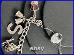 VINTAGE 1975 STERLING SILVER 3D CHARM BRACELET AND CHARMS with HEART CLASP VINTAGE 1975 STERLING SILVER 3D CHARM BRACELET AND CHARMS with HEART CLASP