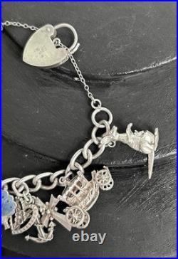 VINTAGE 1975 STERLING SILVER 3D CHARM BRACELET AND CHARMS with HEART CLASP VINTAGE 1975 STERLING SILVER 3D CHARM BRACELET AND CHARMS with HEART CLASP