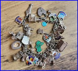 VINTAGE STERLING SILVER CHARM BRACELET 33 rare charms opening and closing charms