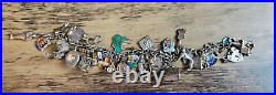 VINTAGE STERLING SILVER CHARM BRACELET 33 rare charms opening and closing charms