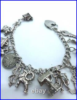 VINTAGE STERLING SILVER CHARM BRACELET 925 ASSORTED CHARMS 20th CENTURY 41.7g