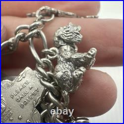 VINTAGE Sterling Silver Charm Bracelet 15 Charms Germany Religious Theme 59.3g VINTAGE Sterling Silver Charm Bracelet 15 Charms Germany Religious Theme 59.3g