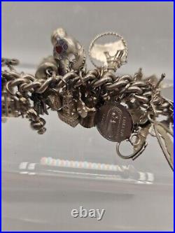 VTG Sterling Silver Charm Bracelet, sterling Approx 52 charms Including Disney