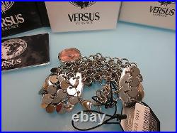 Versus by Versace Women SGD030012 Lights SS Pink Dial Charm Bracelet Watch
