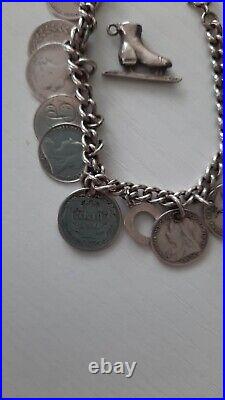 Victorian silver love token charm bracelet with an extra charm 1800's