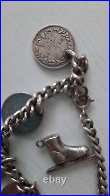 Victorian silver love token charm bracelet with an extra charm 1800's