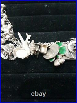Vintage 1943 Sterling Silver Bracelet with 38 Charms