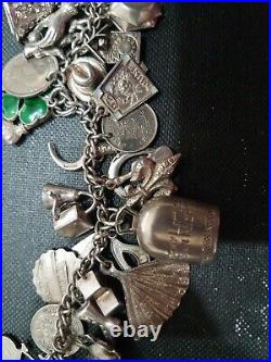 Vintage 1943 Sterling Silver Bracelet with 38 Charms