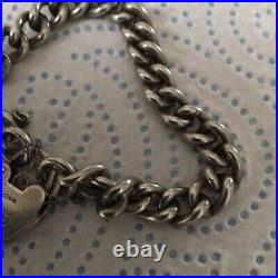 Vintage 1959, sterling silver 8inch Sports charm bracelet