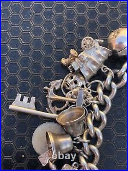 Vintage 1970's Silver 25x piece charm bracelet inc NUVO ice bucket padlock 101g