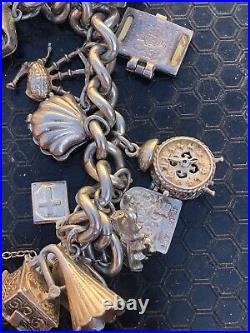 Vintage 1970's Silver 25x piece charm bracelet inc NUVO ice bucket padlock 101g