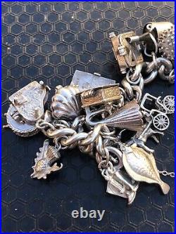 Vintage 1970's Silver 25x piece charm bracelet inc NUVO ice bucket padlock 101g