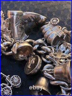 Vintage 1970's Silver 25x piece charm bracelet inc NUVO ice bucket padlock 101g