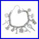 Vintage-1973-sterling-silver-charm-bracelet-11-charms-and-heart-padlock-bear-01-rk