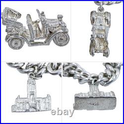 Vintage 1973 sterling silver charm bracelet, 11 charms and heart padlock, bear