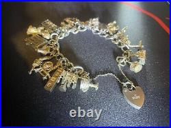 Vintage 1975 Birmingham Silver Charm Bracelet with 22 Charms inc Opening/Moving