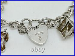 Vintage 1976 English Sterling Silver Heavy Charm Bracelet 7 + 21 Charms 61g