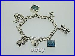 Vintage 1979 Sterling Silver Charm Bracelet Six Charms 36.3g 6 3/4 Heart Clasp
