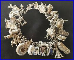 Vintage 19cm Sterling Silver Charm Bracelet 50 charms 4 Articulated 127 grams