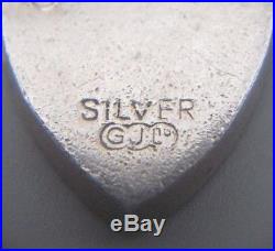 Vintage 6.5'' solid silver charm bracelet 21 charms, G. J. Ltd, London (95.78g)