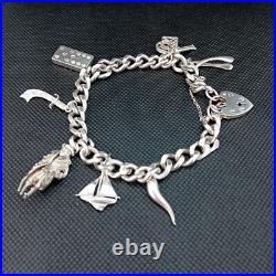 Vintage 925 Sterling Silver Charm Bracelet With 8 Silver Charms Vintage 925 Sterling Silver Charm Bracelet With 8 Silver Charms