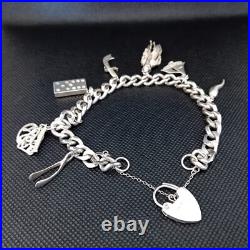 Vintage 925 Sterling Silver Charm Bracelet With 8 Silver Charms Vintage 925 Sterling Silver Charm Bracelet With 8 Silver Charms