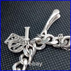 Vintage 925 Sterling Silver Charm Bracelet With 8 Silver Charms Vintage 925 Sterling Silver Charm Bracelet With 8 Silver Charms