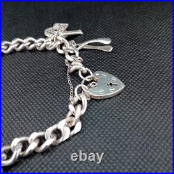 Vintage 925 Sterling Silver Charm Bracelet With 8 Silver Charms Vintage 925 Sterling Silver Charm Bracelet With 8 Silver Charms
