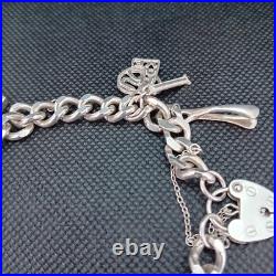 Vintage 925 Sterling Silver Charm Bracelet With 8 Silver Charms Vintage 925 Sterling Silver Charm Bracelet With 8 Silver Charms