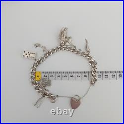 Vintage 925 Sterling Silver Charm Bracelet With 8 Silver Charms Vintage 925 Sterling Silver Charm Bracelet With 8 Silver Charms