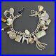 Vintage-925-Sterling-Silver-Charm-Bracelet-and-21-Charms-3-6-pence-coins-01-djm