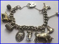 Vintage 925 Sterling Silver Ladies Charm Bracelet, (9xcharms) 63.73, Grams