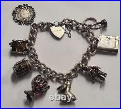 Vintage 925 Sterling Silver heavy Bracelet with Heart Padlock and 8 Charms