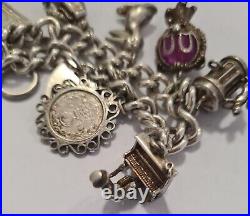 Vintage 925 Sterling Silver heavy Bracelet with Heart Padlock and 8 Charms