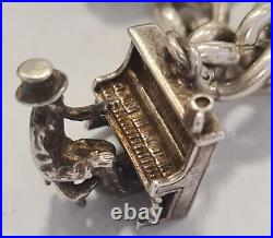 Vintage 925 Sterling Silver heavy Bracelet with Heart Padlock and 8 Charms