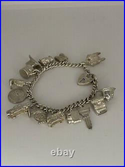 Vintage 925 silver charm bracelet Weight 42.4g 14 Charms Heart Lock