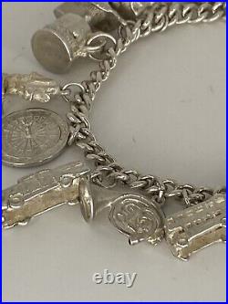 Vintage 925 silver charm bracelet Weight 42.4g 14 Charms Heart Lock
