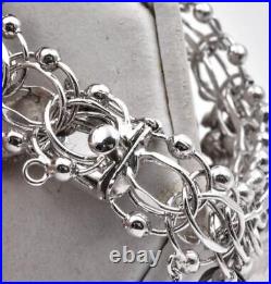 Vintage American Sterling Silver & 7 charm Traditional wide style Bracelet 7.1