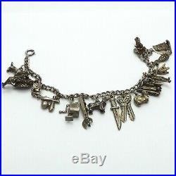 Vintage Antique Sterling Silver Charm Bracelet with 17 Charms Many Articulated