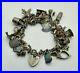 Vintage-Antique-Sterling-Silver-Charm-Bracelet-with-24-Silver-Charms-63-grams-01-xr
