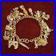 Vintage-Charm-Bracelet-Silver-18ct-Gold-Gilt-24-Charms-01-hh