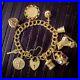 Vintage-Charm-Bracelet-Silver-18ct-Gold-Gilt-9-Charms-And-Heart-Padlock-01-lax