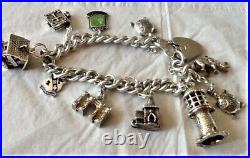 Vintage Charm Bracelet Sterling Silver with 10 silver charms 1960's