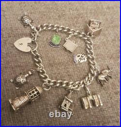 Vintage Charm Bracelet Sterling Silver with 10 silver charms 1960's