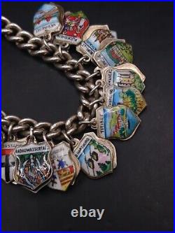 Vintage English Sterling Silver 7 Charm Bracelet With 50 Enamel Shield Charms