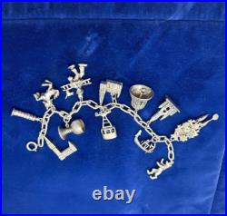 Vintage German 835 Sterling Silver Charm Bracelet 12 Charms 7 3/8 in Length Vintage German 835 Sterling Silver Charm Bracelet 12 Charms 7 3/8 in Length