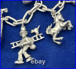 Vintage German 835 Sterling Silver Charm Bracelet 12 Charms 7 3/8 in Length Vintage German 835 Sterling Silver Charm Bracelet 12 Charms 7 3/8 in Length