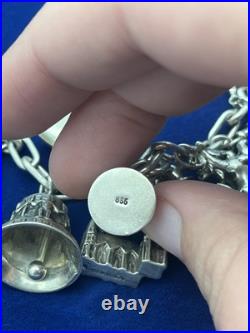 Vintage German 835 Sterling Silver Charm Bracelet 12 Charms 7 3/8 in Length Vintage German 835 Sterling Silver Charm Bracelet 12 Charms 7 3/8 in Length